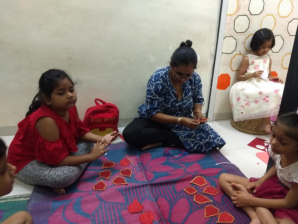 Quiet craft circle — patience and presence.